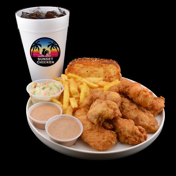 Sunset Chicken meal with fried chicken, fries, coleslaw, dipping sauces, and a drink.